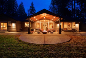 Patio cover built in backyard with lighting in  Cheyenne, WY