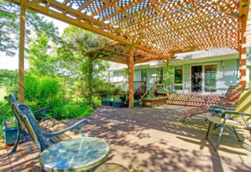 Custom Pergola built in backyard on residential home.