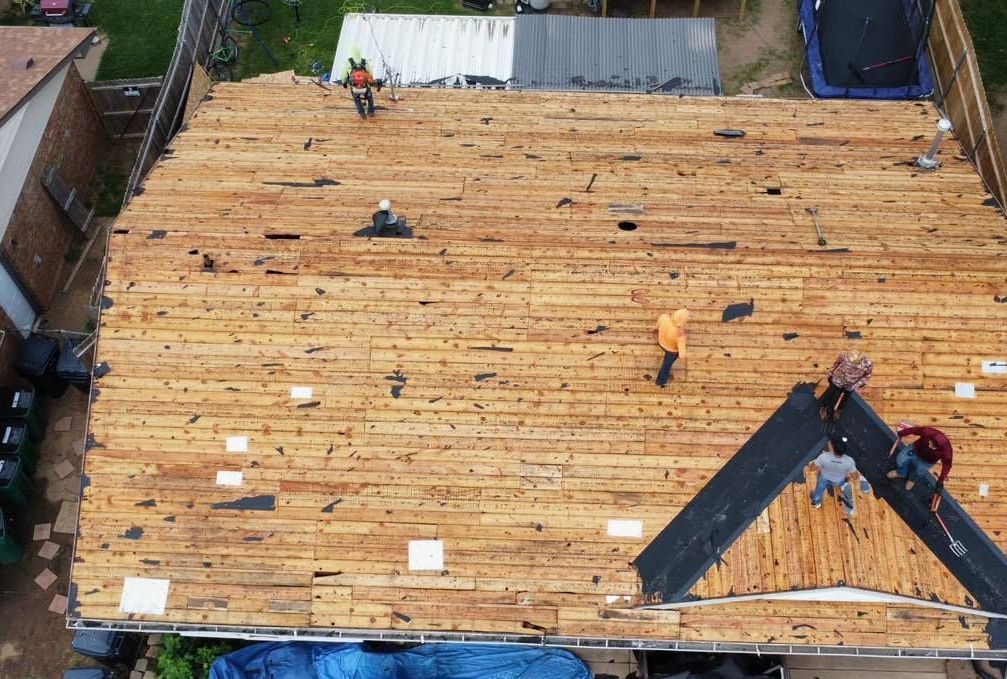 An aerial view of a wooden roof under construction.