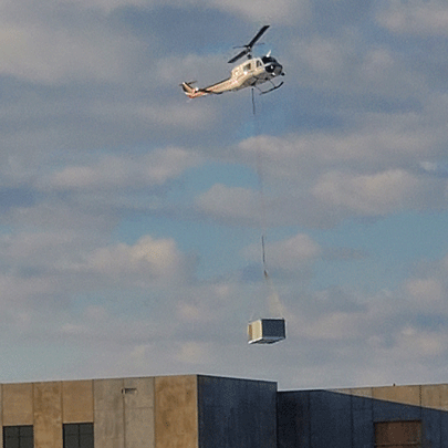Helicopter Lifting Air Conditioner — Woodstock, IL — Jensen’s Plumbing & HVAC