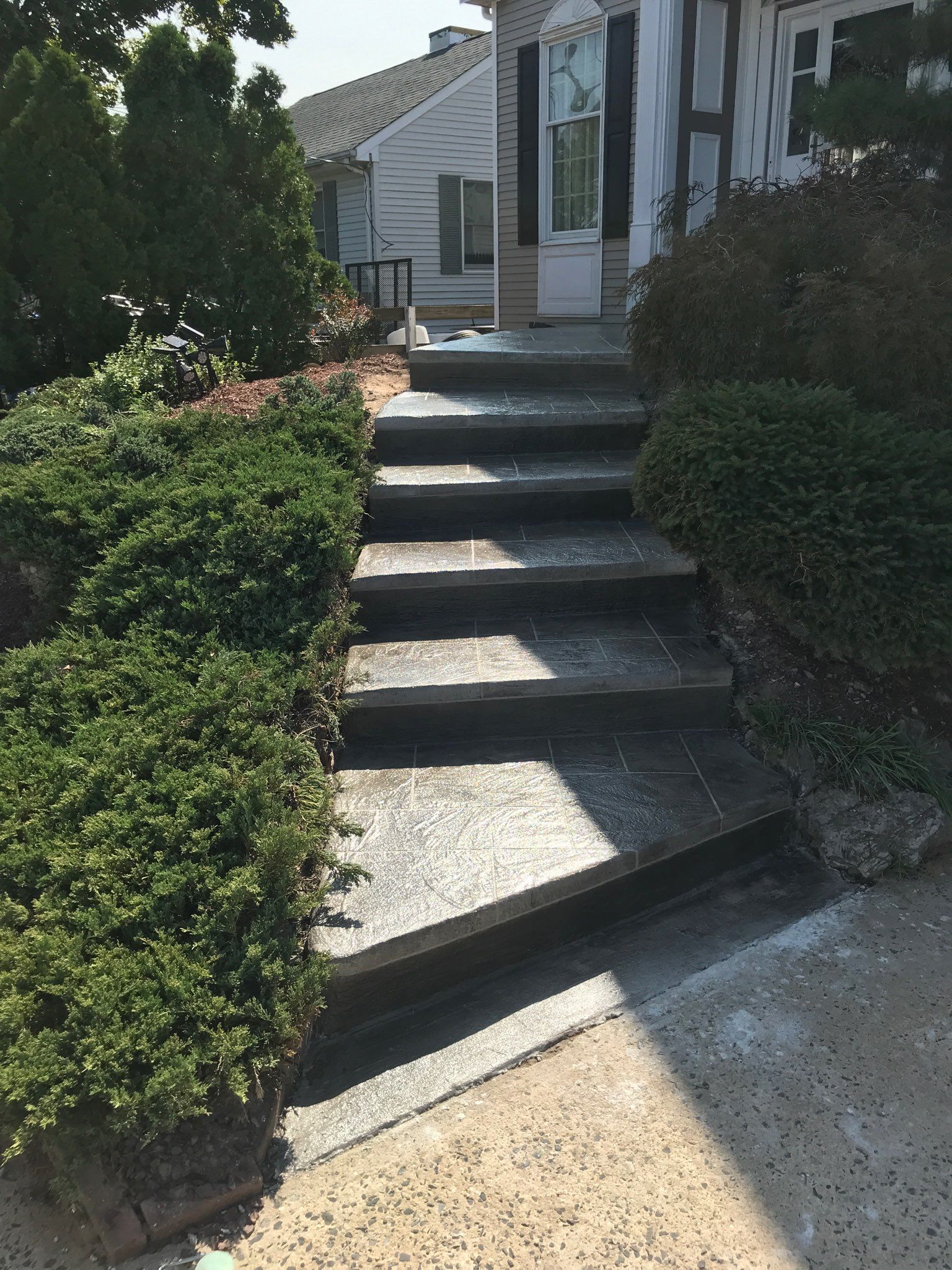 Residential stairway with nice floor decoration — New Jersey — Konkreate & Epoxy