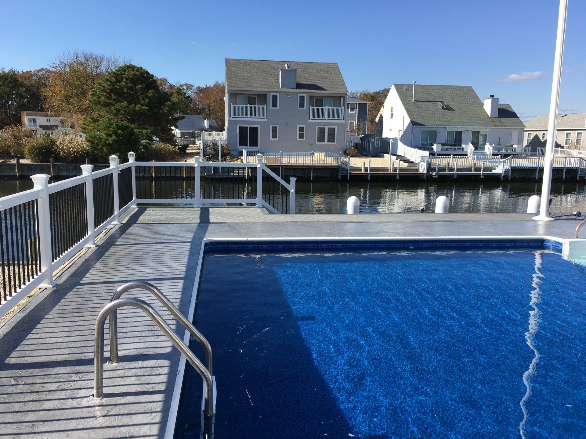 Wide view of a pool with rough designed floor — New Jersey — Konkreate & Epoxy