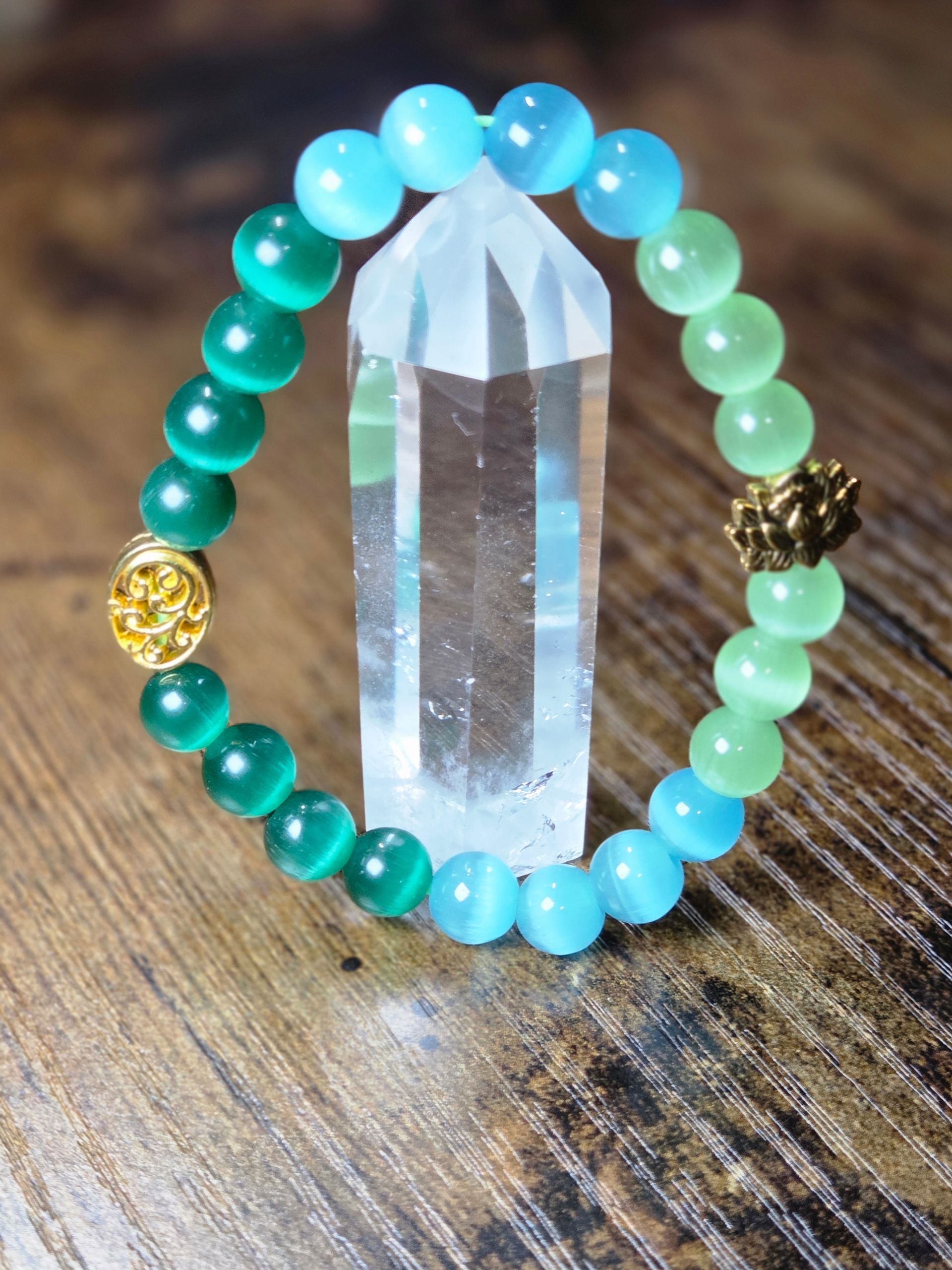 Blue, Green, and Lime Green Cat's Eye with a floral and lotus spacer