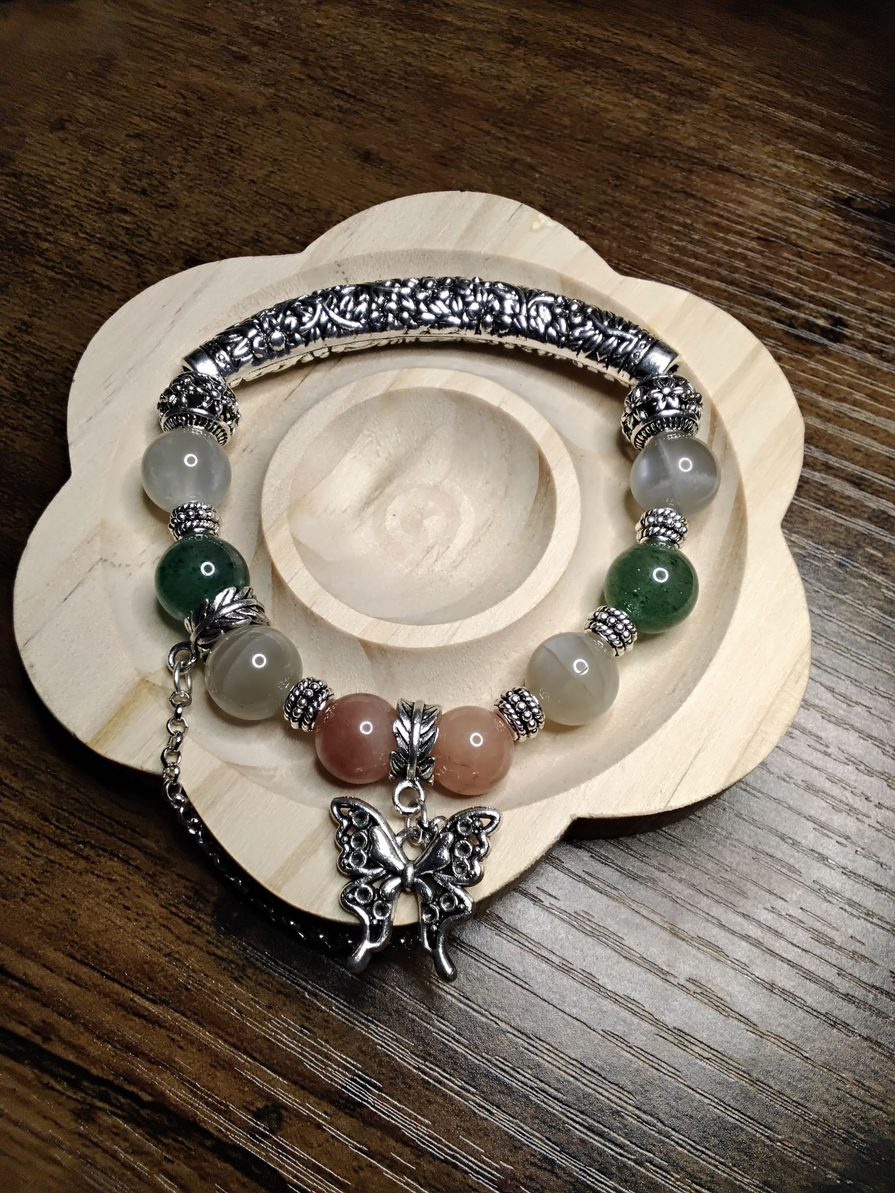 Half Metal Bangle with Gray Moonstone, Sunstone, Green Strawberry Quartz with a Butterfly Dangle