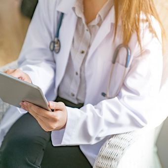 Doctor Using Digital Tablet — Colorado Springs, CO — Dynamic Family Medicine