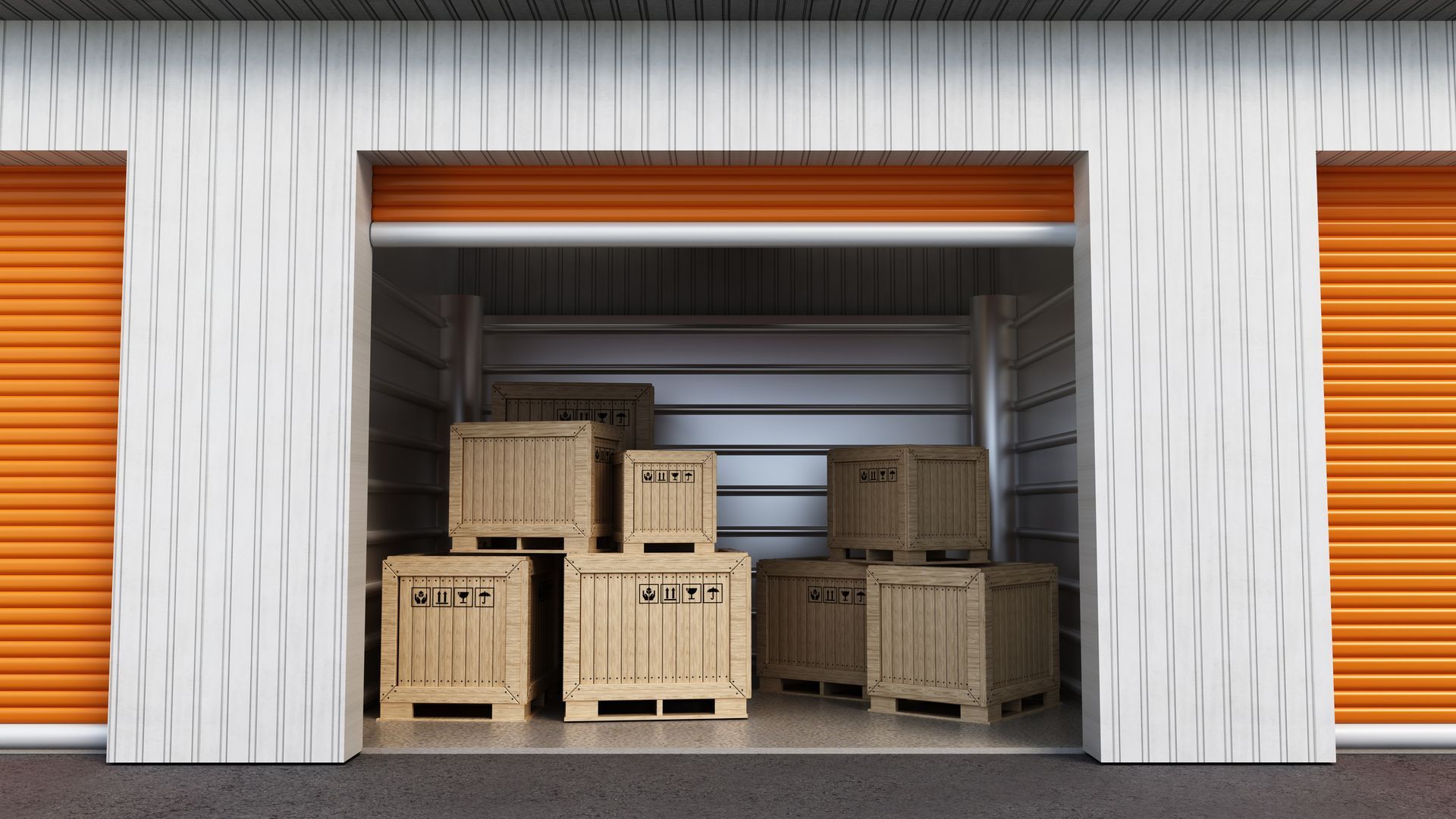 Storage unit with open door revealing wooden crates inside. Orange door and white building.