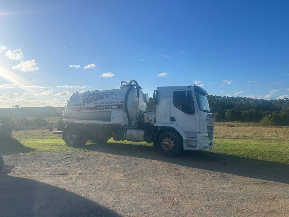 A Poo Pumpers White Vacuum Truck — Gympie Poo Pumpers in Goomeri, QLD 