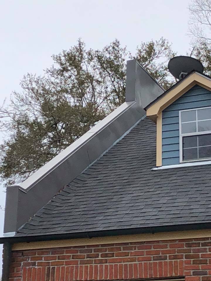 shingled roof with a dormer