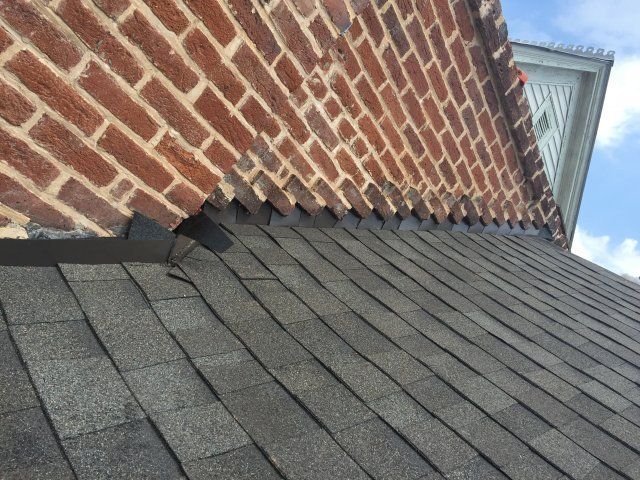 roof shingles against brick