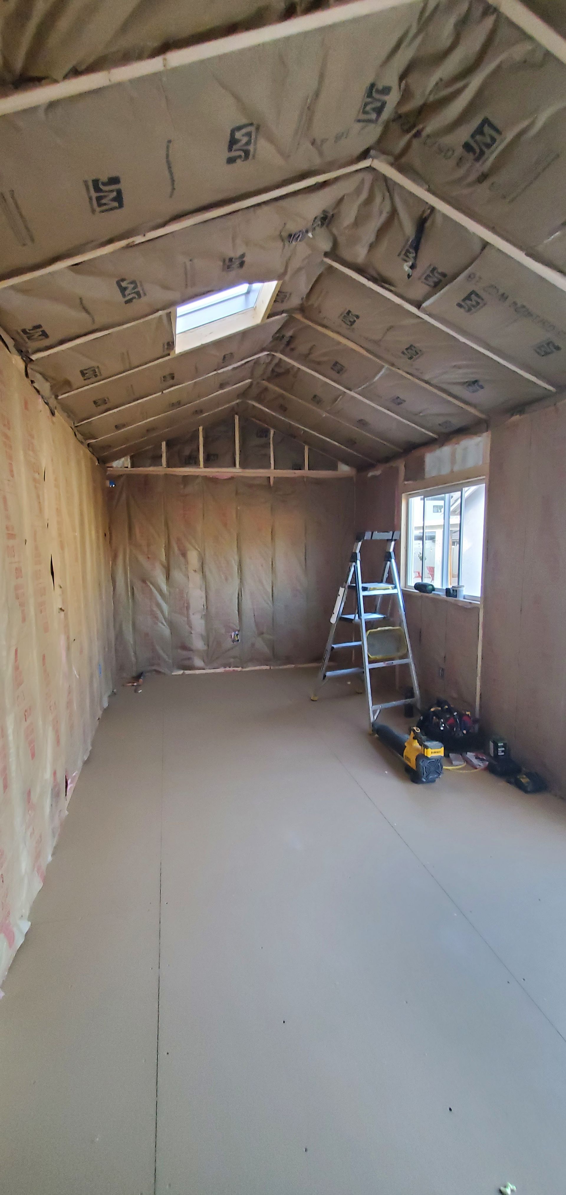 There is a ladder in the middle of the room.