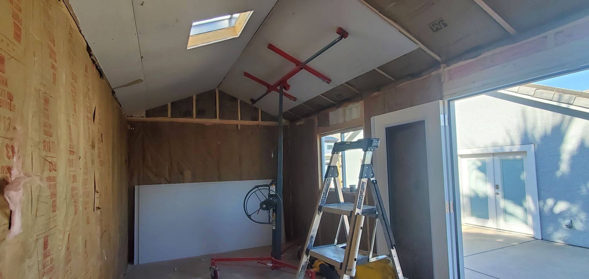 There is a ladder in the middle of the room.