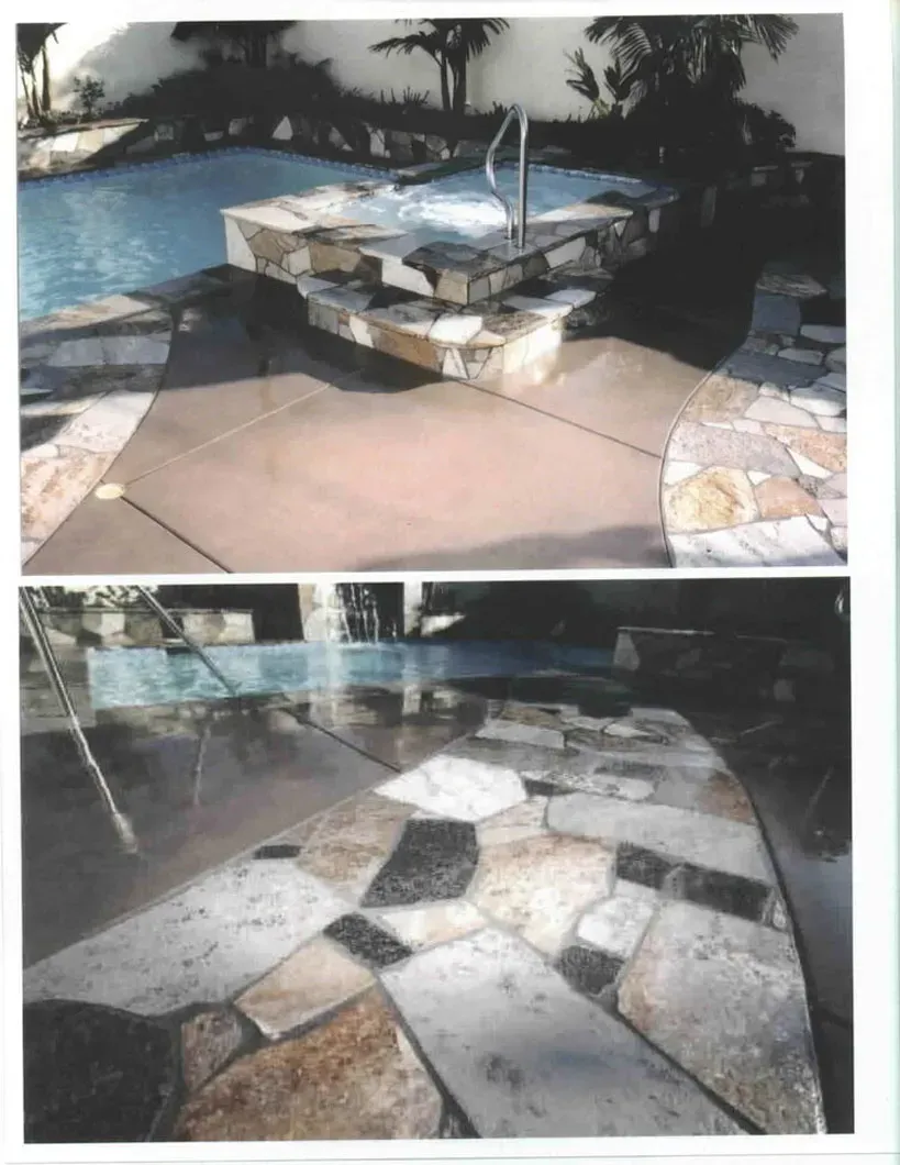 Pool and spa with flagstone and concrete decking.