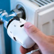 One hand adjust thermostat valve close up