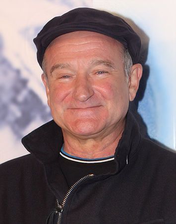 Imagem contendo uma foto do Robin Williams sorrindo.
