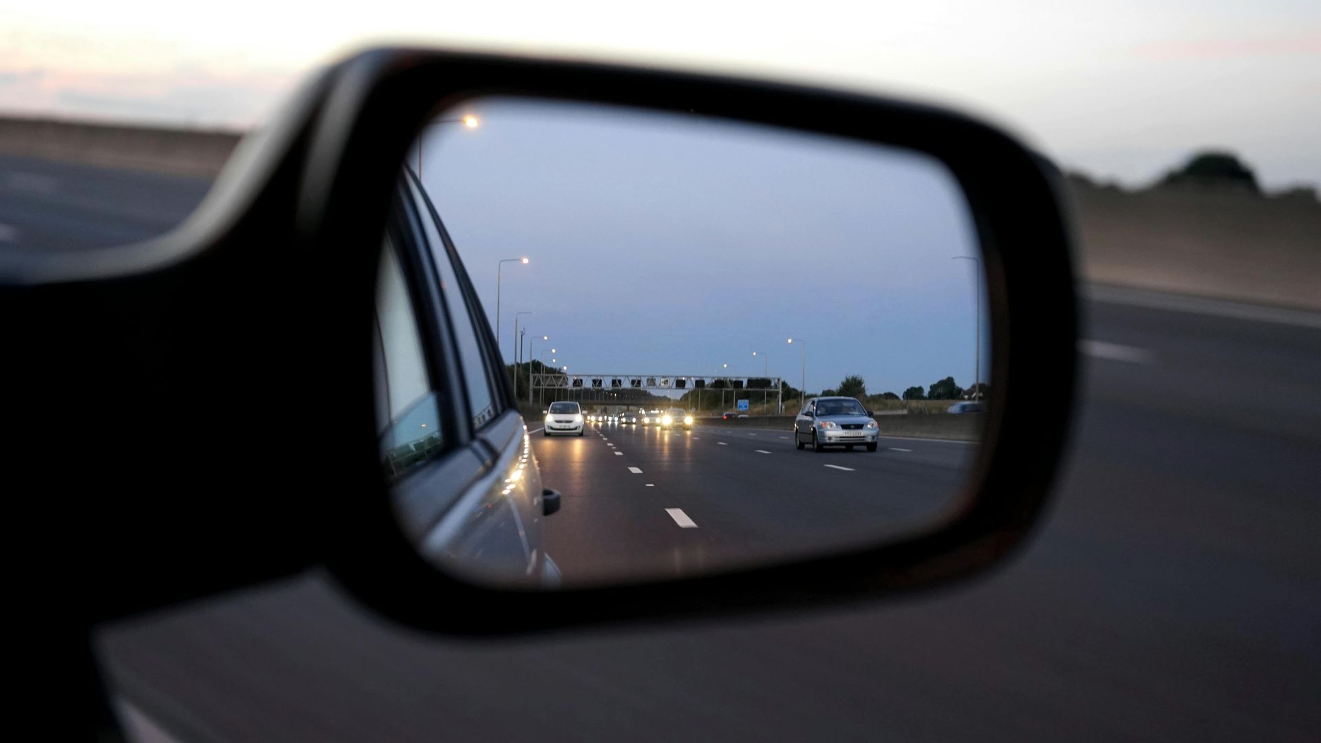 traffic in rearview mirror | Super Service of Aliso Viejo