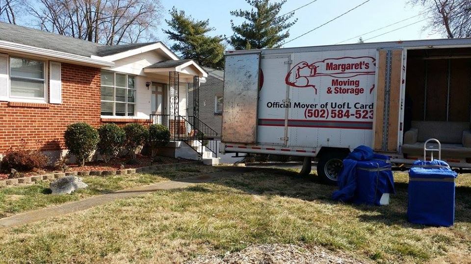 Delivery Men Unloading Boxes from Truck — Louisville, KY — Margaret’s Moving & Storage