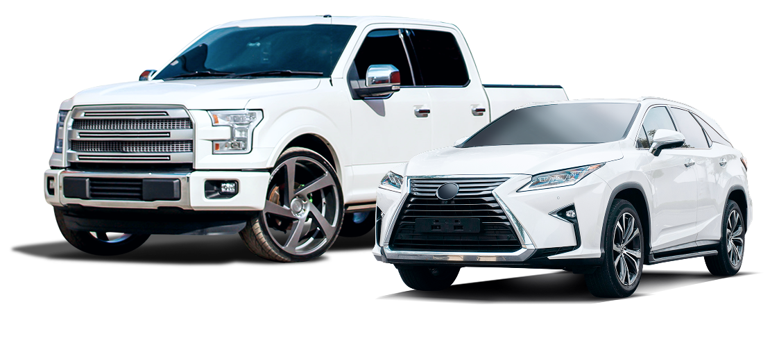 A white pickup truck parked next to a white Lexus SUV against a plain white background.