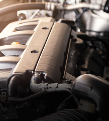 Up close to engine of vehicle | Roe Jan Auto Center LLC