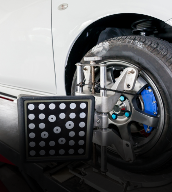 Car set up for wheel alignment | Roe Jan Auto Center LLC