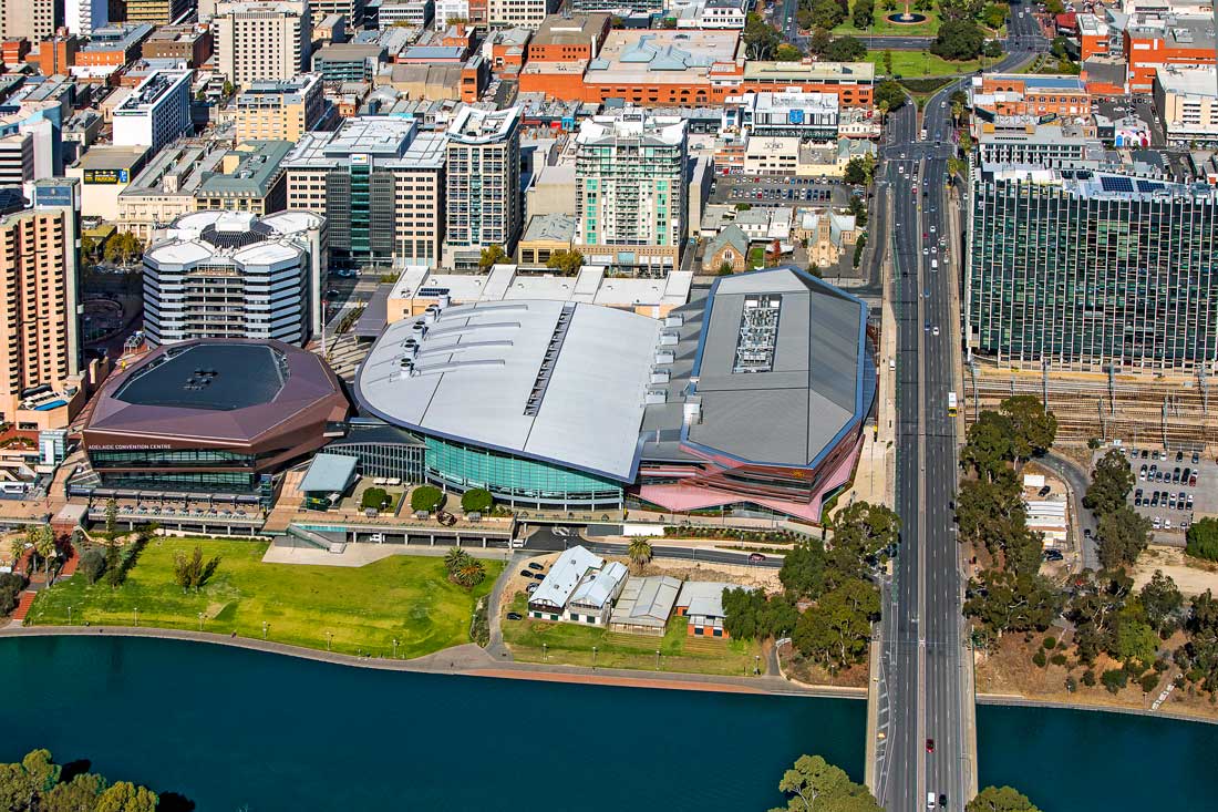 Aerial photo of city with bridge over water