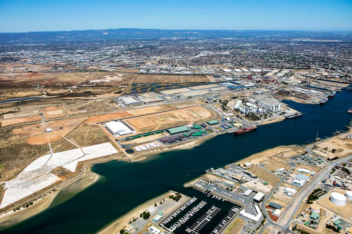 Aerial photo of rural area next to city and body of water