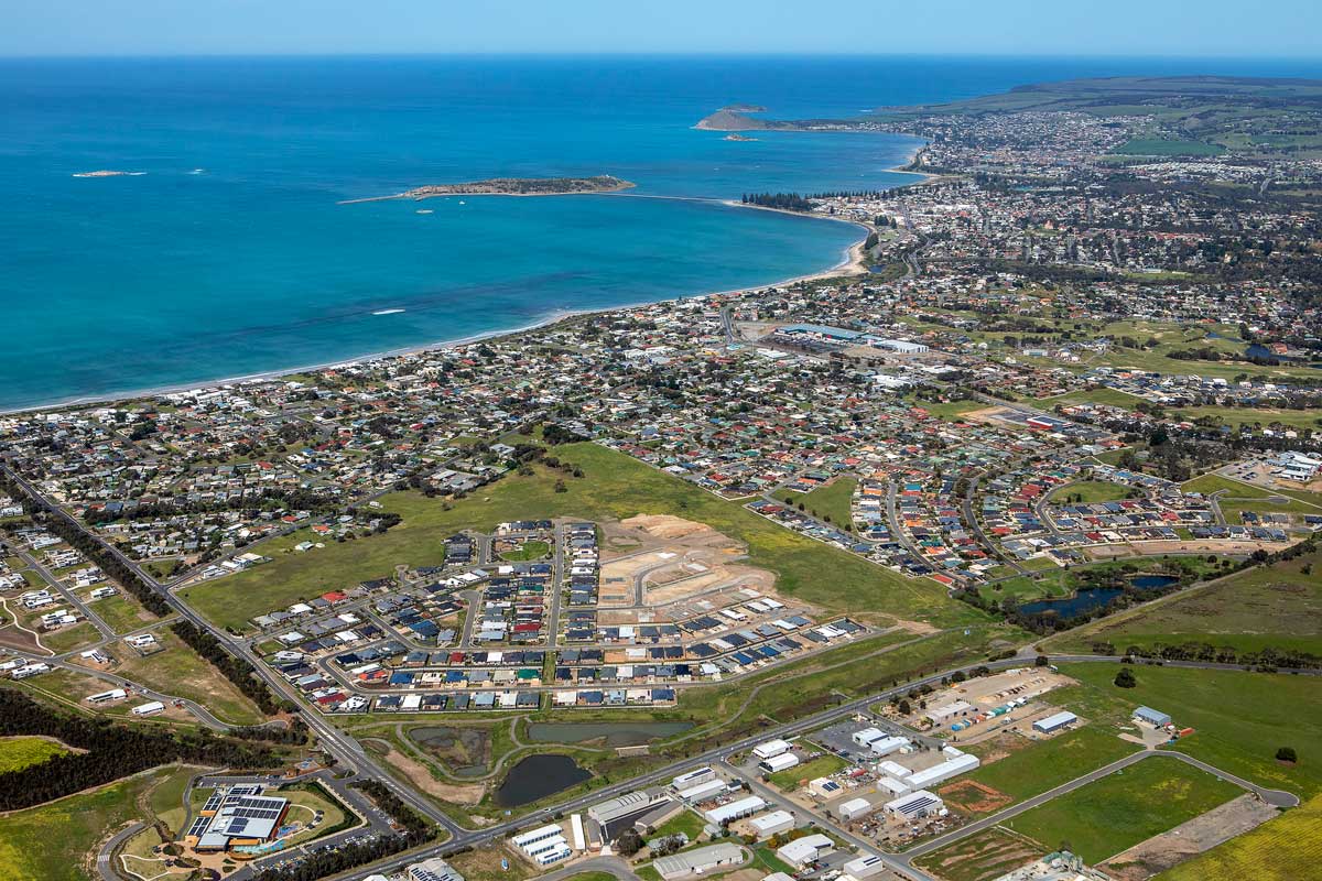Aerial photo of the city next to the ocean