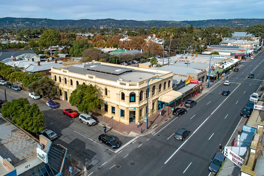 drone photo on yellow building left corner view
