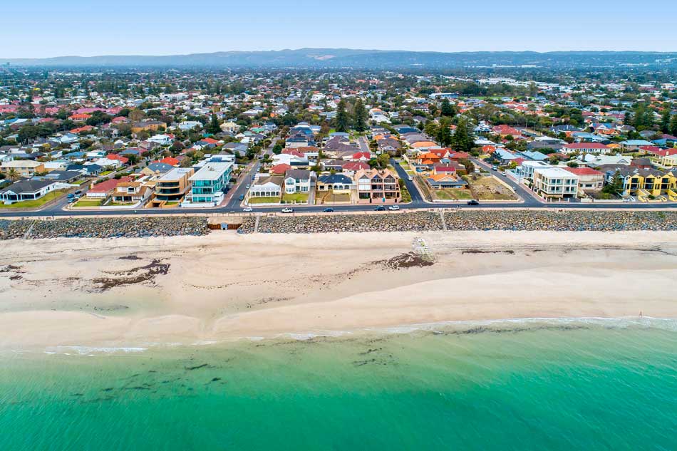 drone photo of beach and to the city