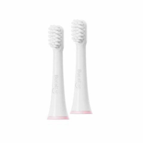 Cepillo de dientes eléctrico, color gris, sobre base de carga.