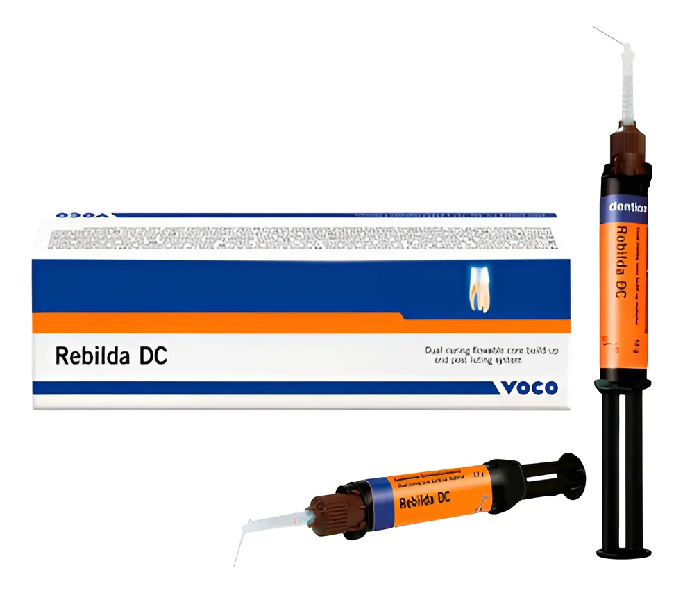 Caja y jeringa de material dental Rebilda DC de Voco. Envase naranja y azul, jeringa con punta aplicadora.