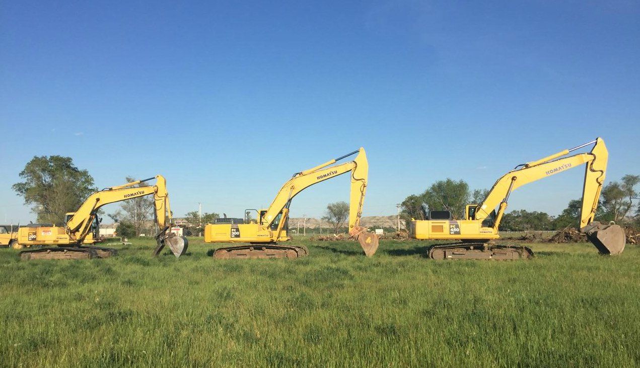 Excavation Truck in a Row — Butte, MT — Hoffman’s R & M Services & Excavation