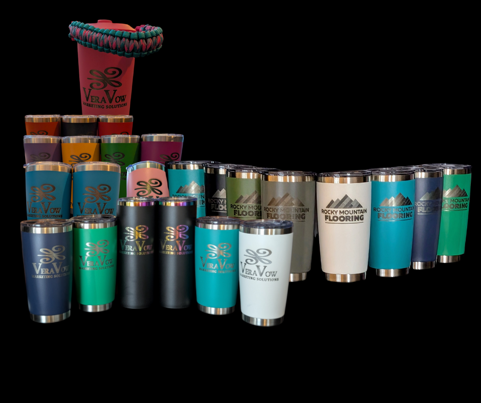 A bunch of different colored tumblers are stacked on top of each other on a black background.