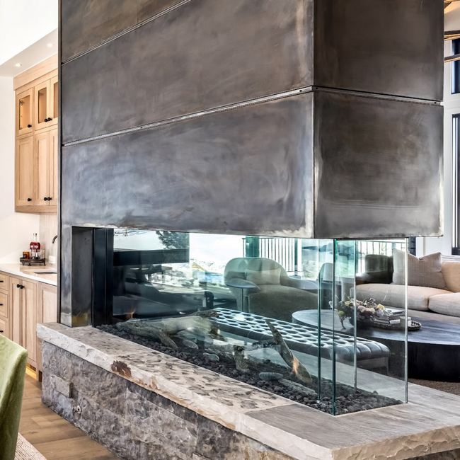 A living room with a fireplace and a couch