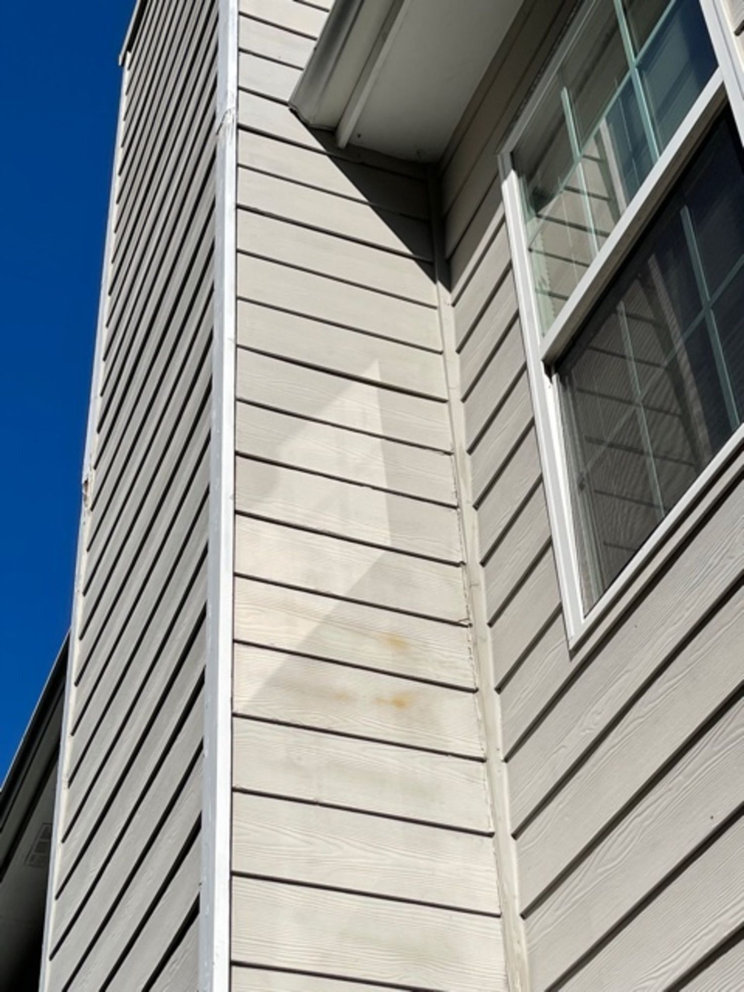 A house with a window on the side of it