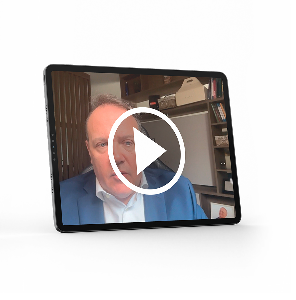 Um tablet branco com a imagem de um livro com o título  