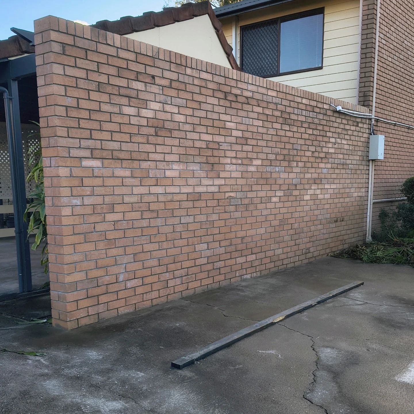 Brick Wall Next To A Building — Bricks By Dre In Nerang, QLD