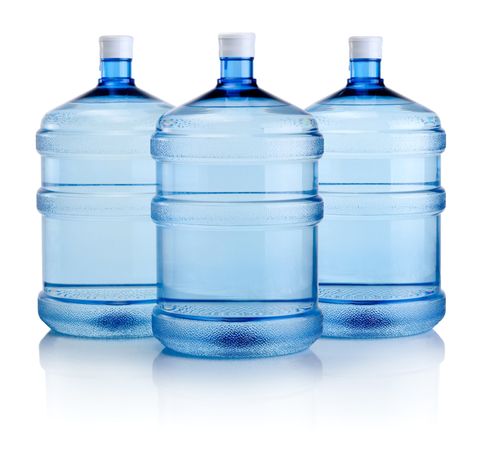Residential Water Delivery — Plastic Bottles Of Water Isolated in Sandusky, OH