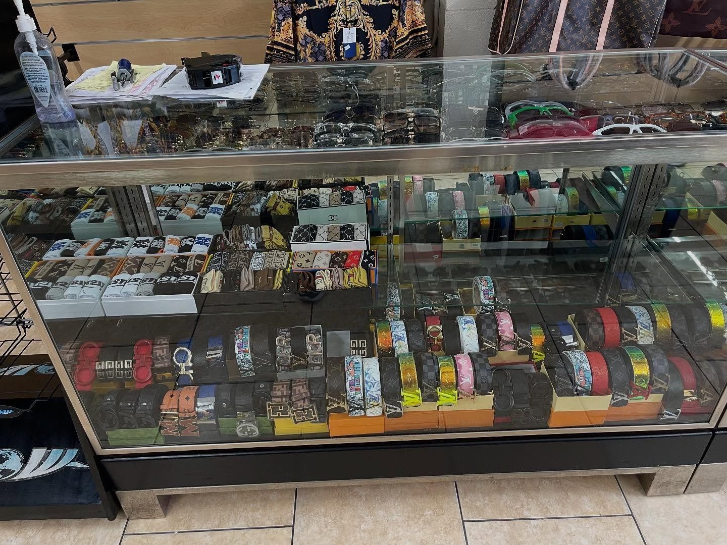 Display case filled with various watches in a store.