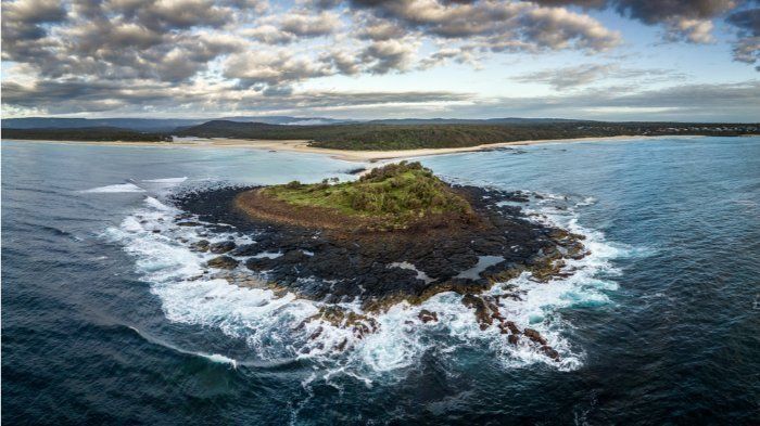 An Aerial View Of A Small Island In The Middle Of The Ocean — Sal's Excavations In Ulladulla, NSW