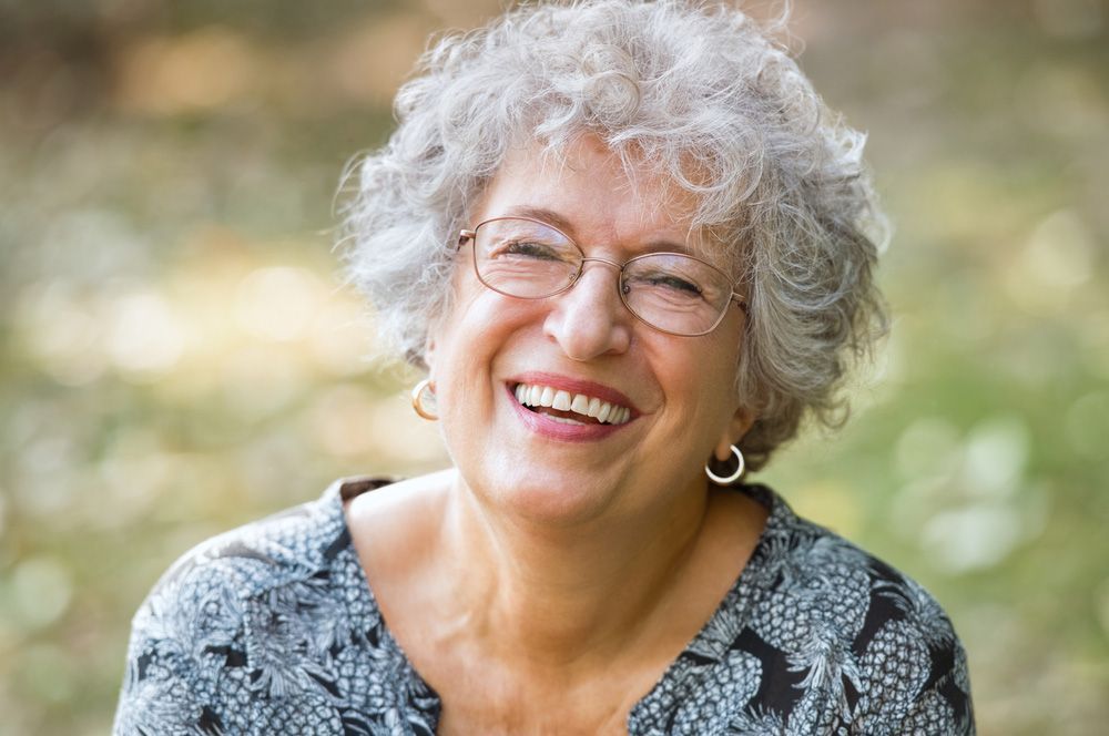 Portrait of senior woman smiling — Emergency Denture Repairs in Newcastle, NSW