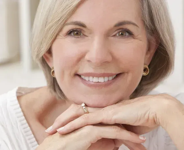 Happy elderly woman enjoying her beautiful — Denture Relining in Newcastle, NSW
