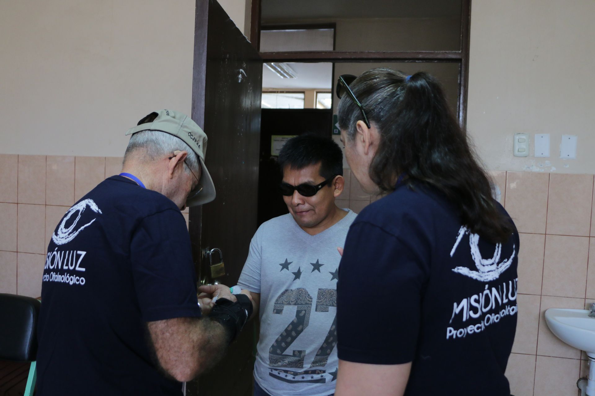 A man wearing a shirt with the number 27 on it