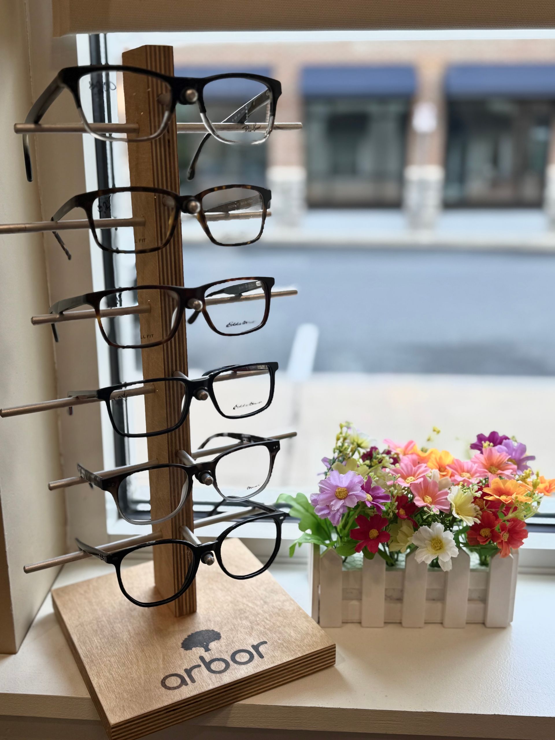 A display of glasses with the word arbor on it