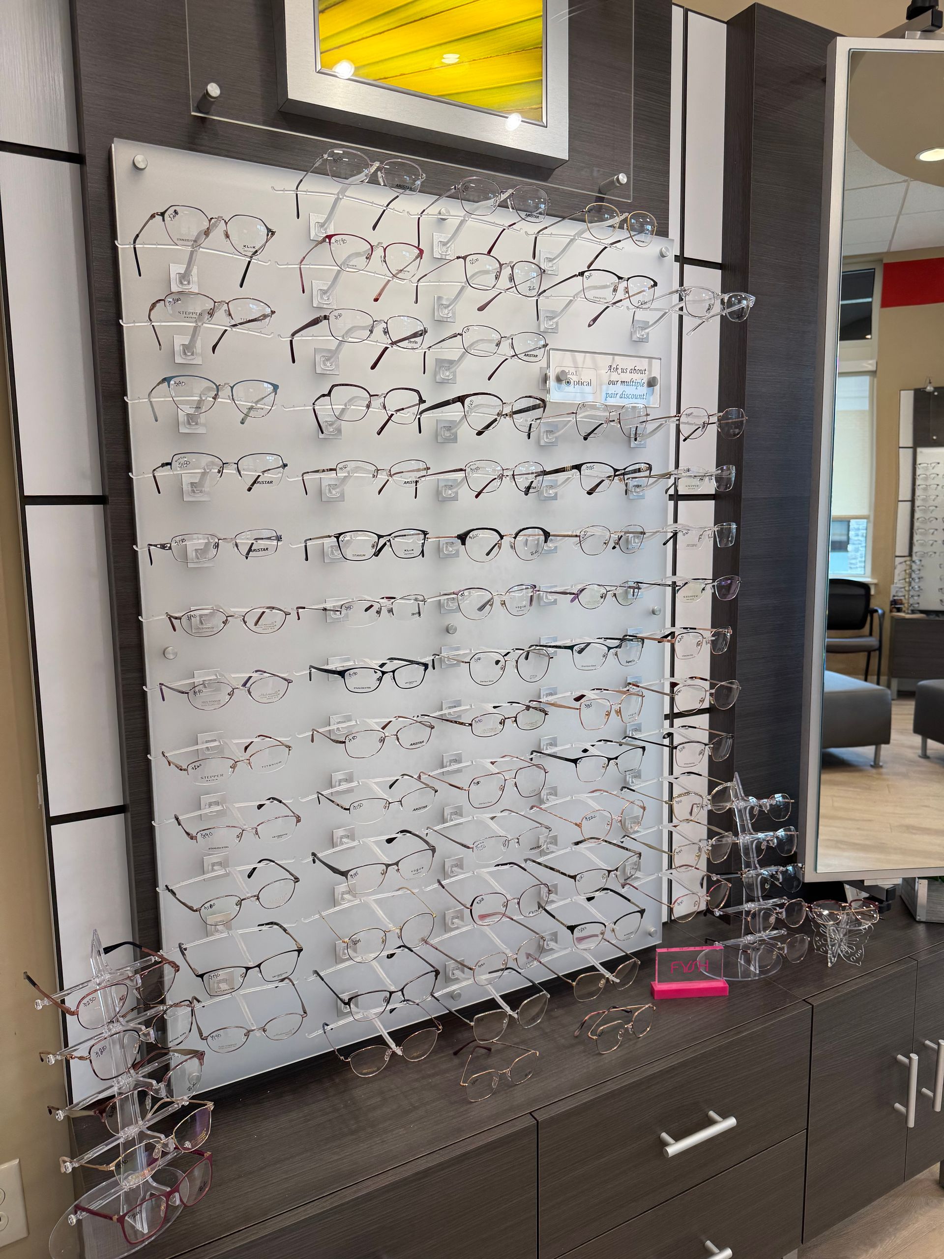 A wall with a lot of glasses on it