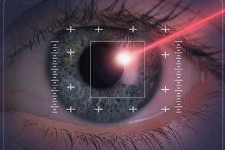 A close up of a person 's eye with a laser in it.