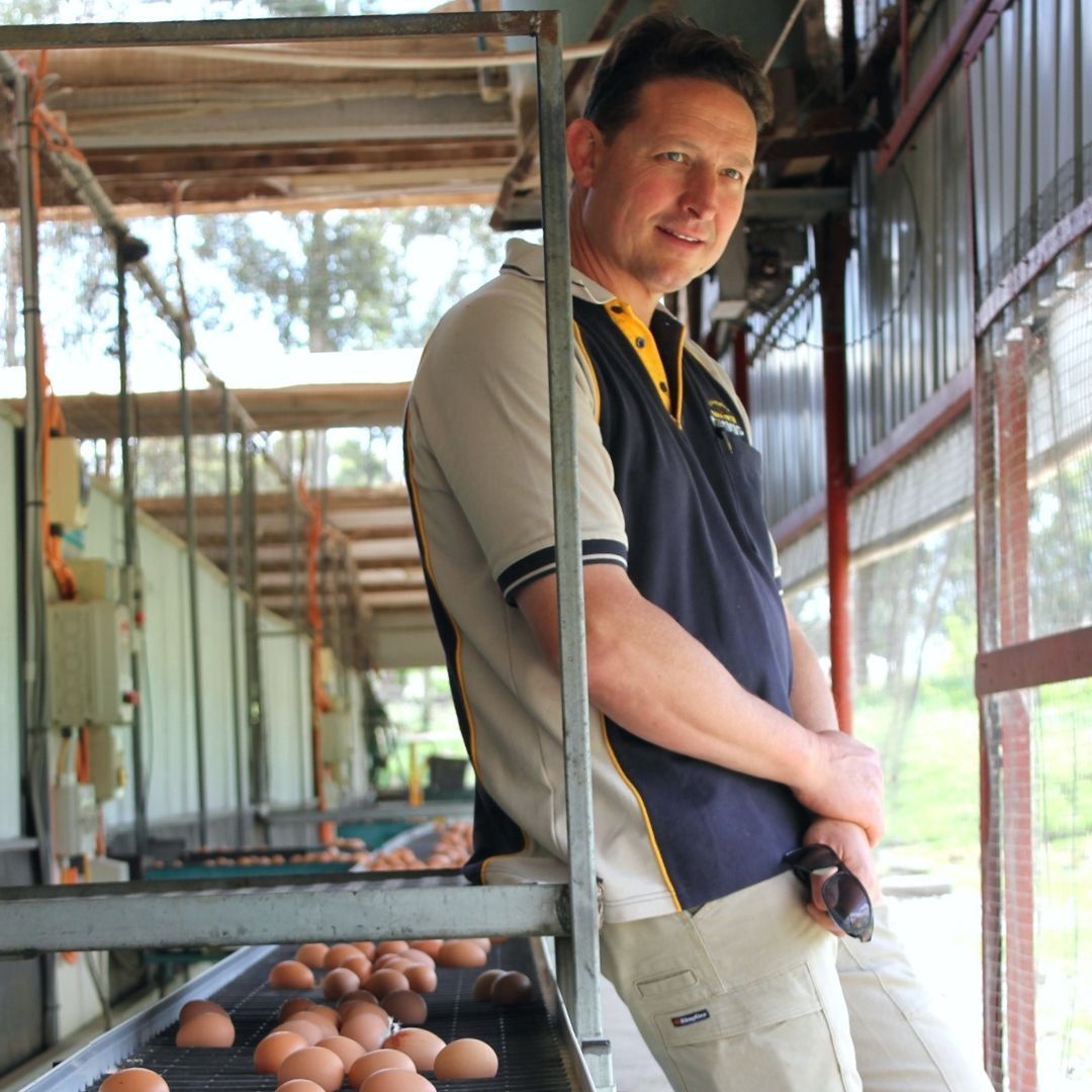 Man Leaning on the Machine — Llandilo, NSW — Llandilo Farm Fresh Eggs