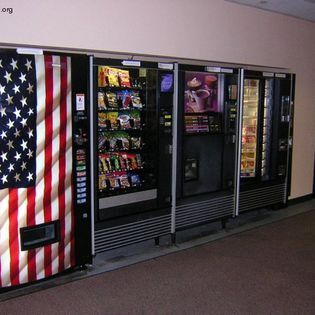 A vending machine with an american flag on it