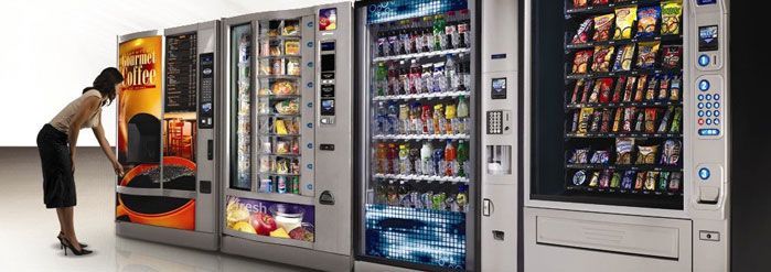 A vending machine filled with a variety of snacks