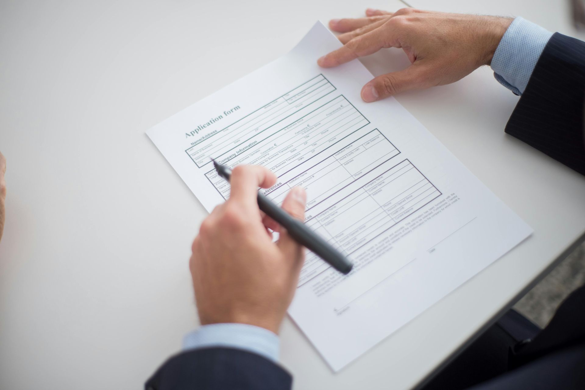 Ohio landlord reviewing a tenant application and resume for screening