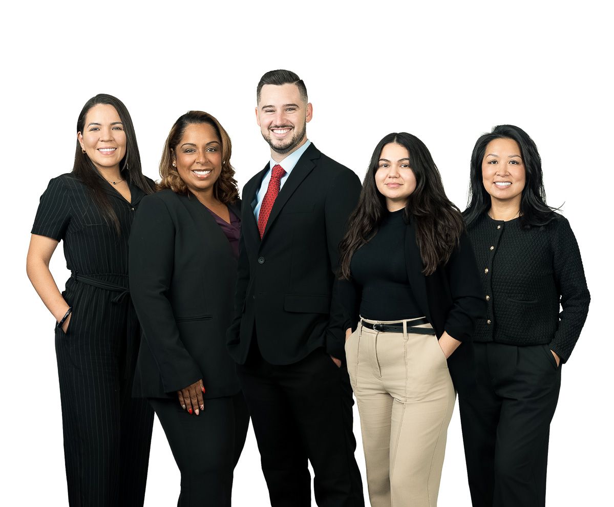 A group of people standing next to each other on a white background.
